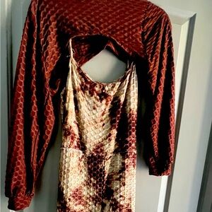 Nice woman ls jumpsuit with matching shall on top.